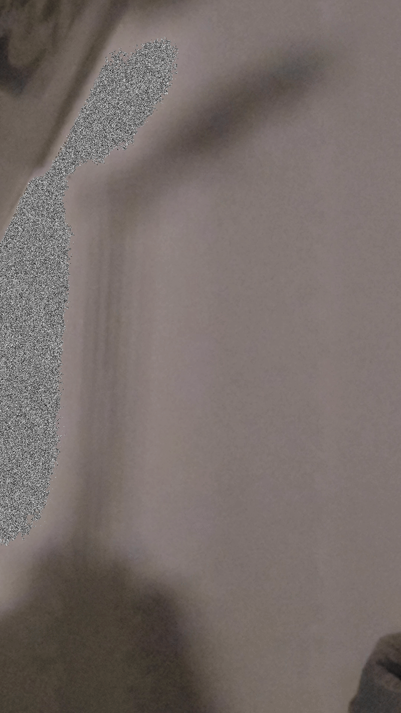 a looping animation of a shadow on a wall with occasional visual noise moving across the screen